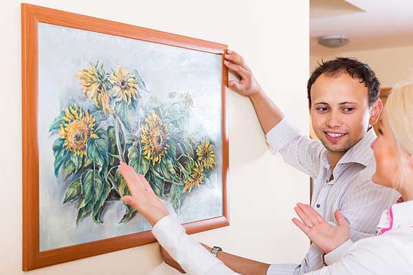 Hanging A Painting At Home